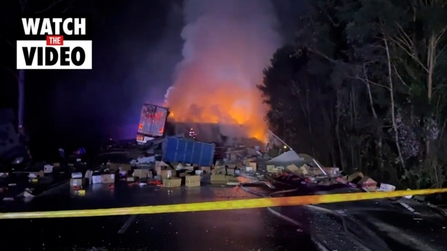 Two people have died after a truck collision on the Pacific Highway