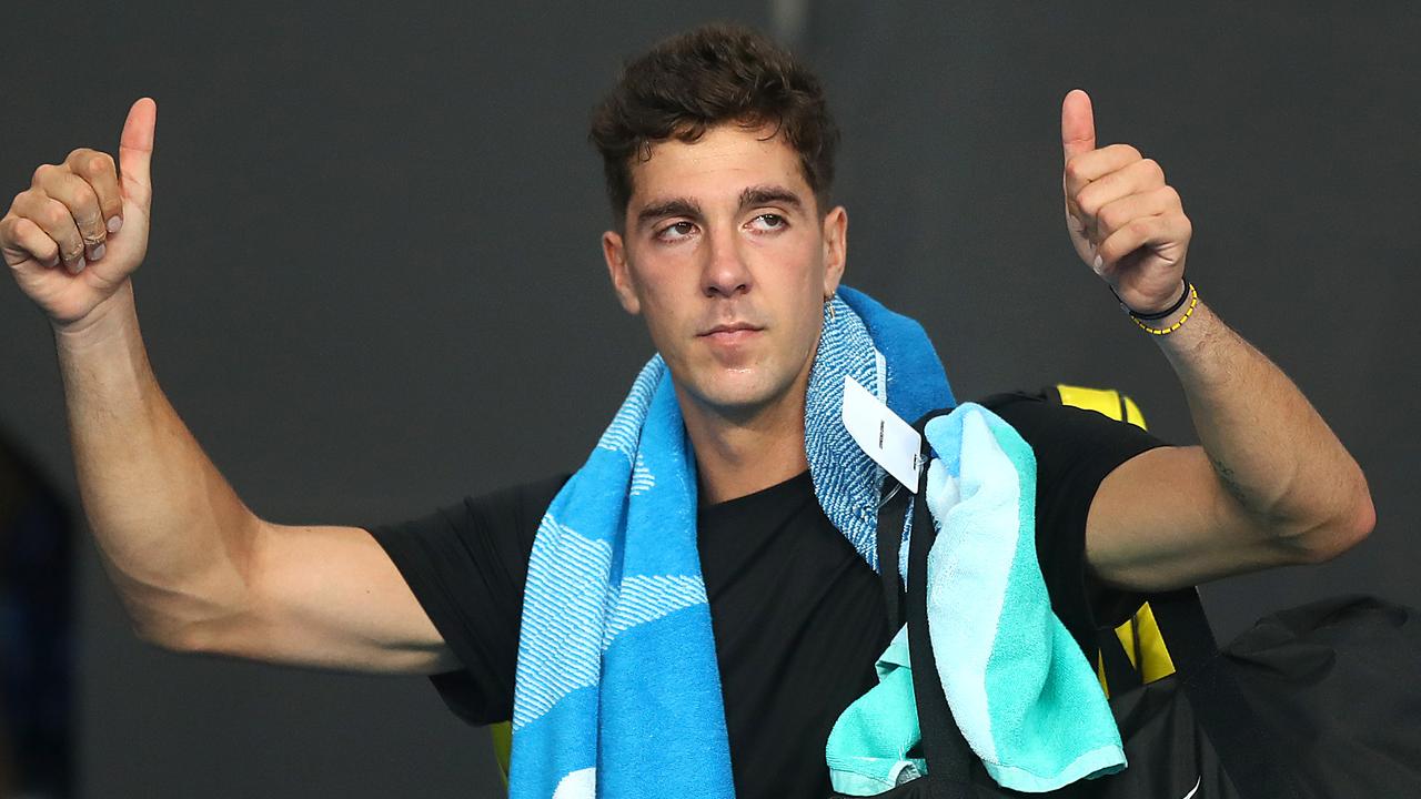 MELBOURNE, AUSTRALIA - FEBRUARY 09: Thanasi Kokkinakis of Australia celebrates after winning match point in his Men's Singles first round match against Soonwoo Kwon of South Korea during day two of the 2021 Australian Open at Melbourne Park on February 09, 2021 in Melbourne, Australia. (Photo by Mike Owen/Getty Images)