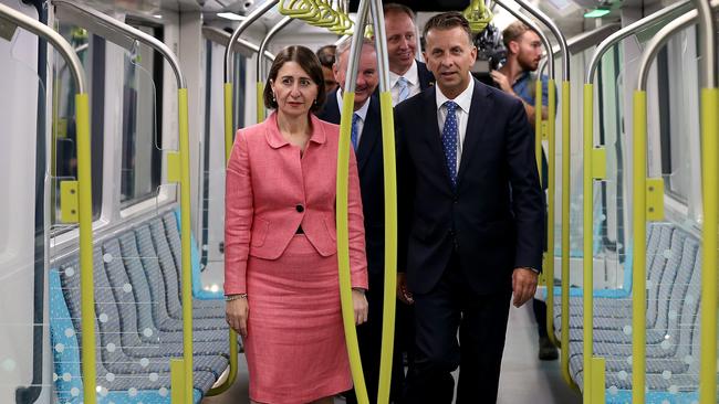 First ride … Premier Gladys Berejiklian and Transport Minister Andrew Constance inspect the new trains. Picture: Toby Zerna