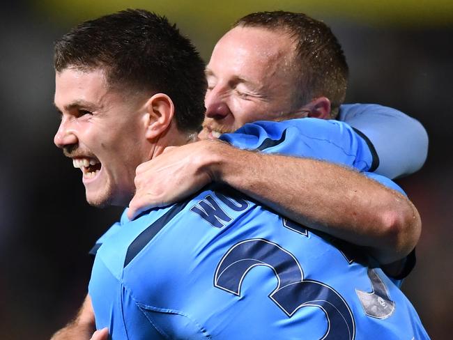 ADELAIDE, AUSTRALIA - MAY 29: Patrick Wood of Sydney FC   celebrates after scoring his teams fourth goal with Ryhan Grant of Sydney FC during the A-League match between Adelaide United and Sydney FC at Coopers Stadium, on May 29, 2021, in Adelaide, Australia. (Photo by Mark Brake/Getty Images)