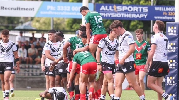 Wynnum Manly's Jared Horne leaps in the air to celebrate a try.