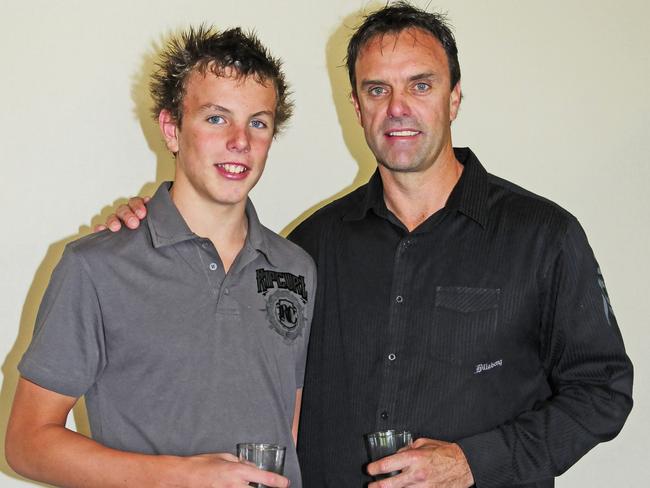 Kyle Chalmers with father Brett after winning Messenger’s School Sports Award in 2011.