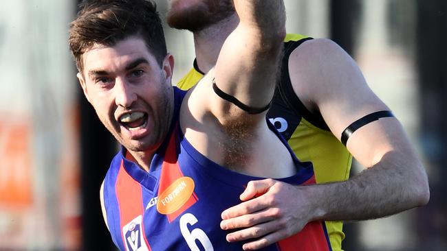 Jordan Lisle is exultant after booting a goal for Port Melbourne against Richmond in 2019.