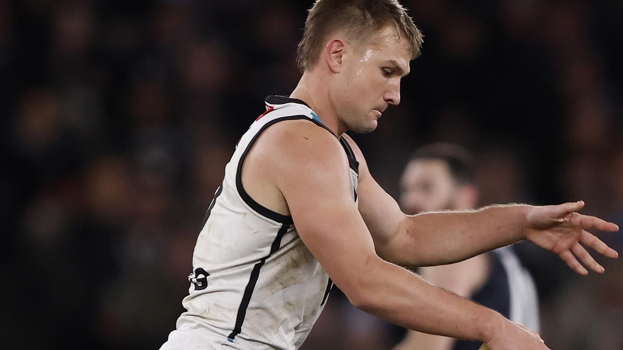 Ollie Wines of the Power runs with the ball during the round 20 AFL match between Carlton Blues and Port Adelaide Power. (Photo by Darrian Traynor/Getty Images)