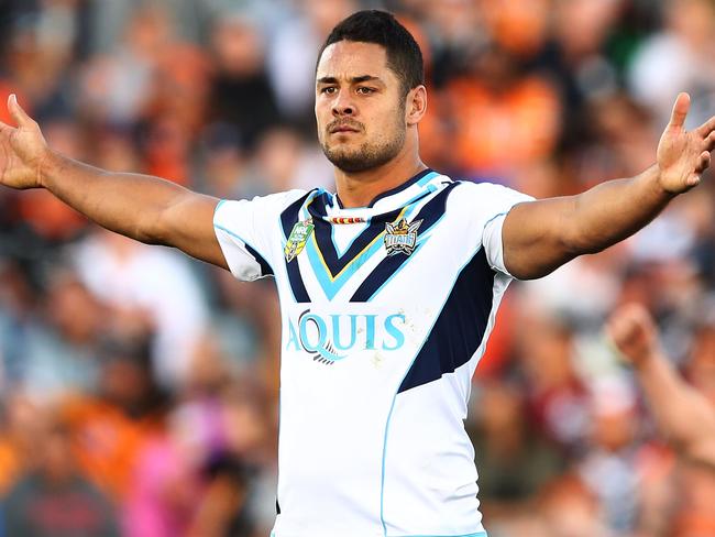 Jarryd Hayne celebrates after kicking a field goal to beat the Tigers.