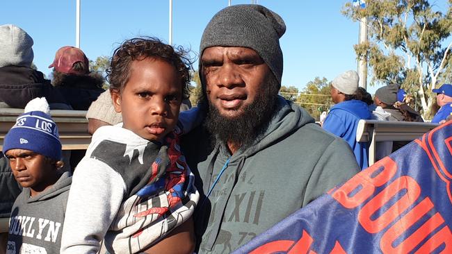 Jurrah and son Jessiah at Traeger Park. The former Demon wants to play under new coach Shannon Motlop at Wanderers in the NTFL this season. Picture: Grey Morris