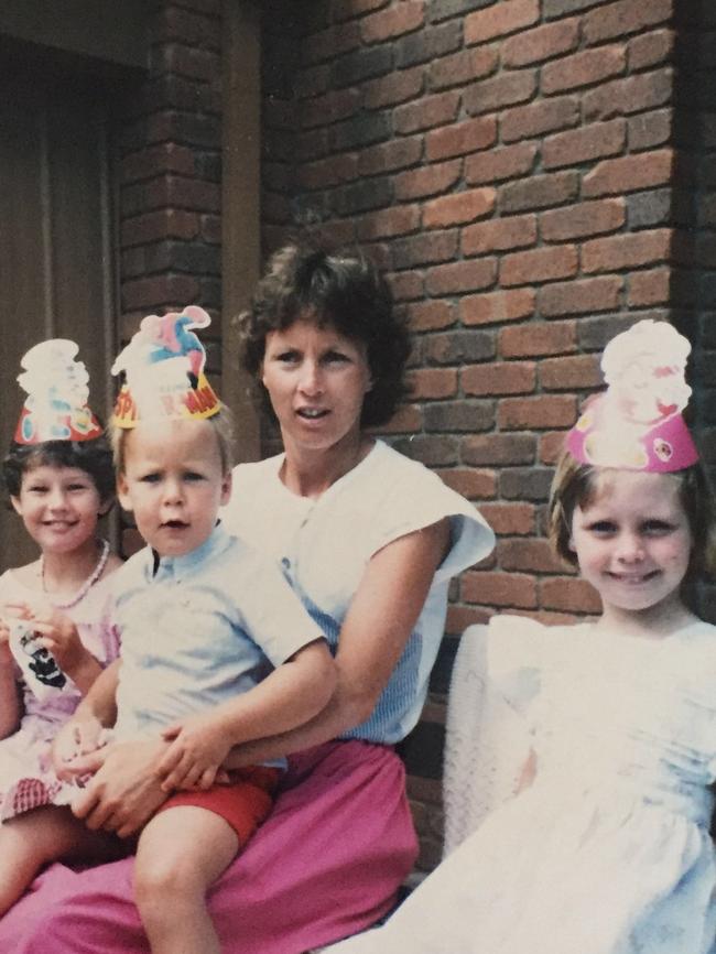 As kids: Geelong footballer Jimmy Bartel with mum Dianne and siblings Olivia and Emma. Picture: Supplied