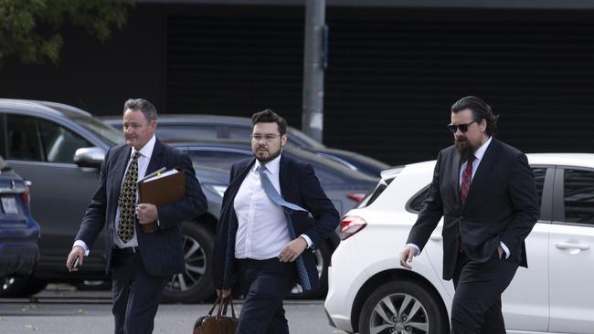 Mr Lehrmann (centre) and his defence lawyer Steve Whybrow (left) during the criminal trial. Picture: NCA NewsWire / Gary Ramage