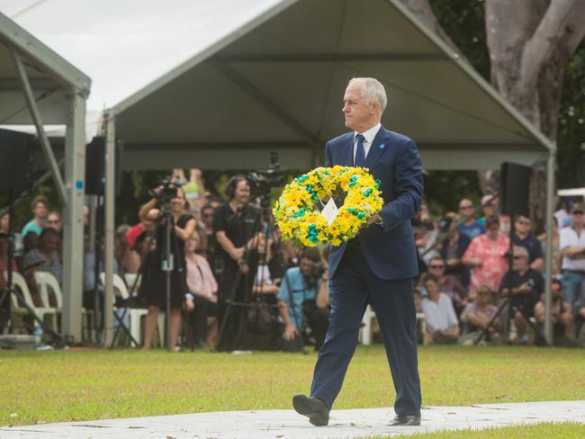 Australian Prime Minister Malcolm Turnbul lays a wreath at the Darwin Cenotaph to commemorate the 75th anniversary of the bombing of Darwin. PICTURE: Elise Derwin