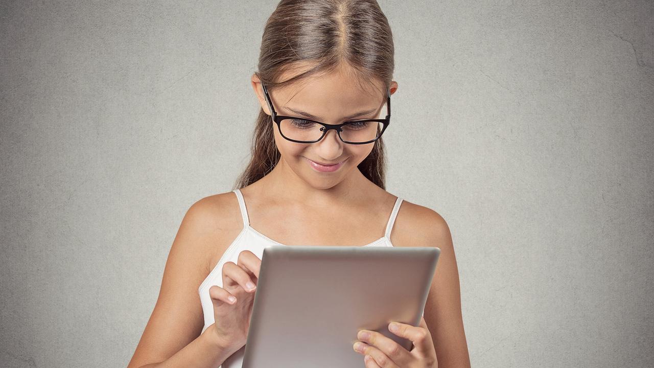 Teenager girl using pad computer