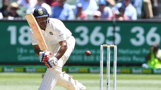 Mayank Agarwal of India plays a stroke on day one of the Boxing Day Test match between Australia and India at the MCG in Melbourne, Wednesday, December 26, 2018. (AAP Image/Julian Smith) NO ARCHIVING, EDITORIAL USE ONLY, IMAGES TO BE USED FOR NEWS REPORTING PURPOSES ONLY, NO COMMERCIAL USE WHATSOEVER, NO USE IN BOOKS WITHOUT PRIOR WRITTEN CONSENT FROM AAP