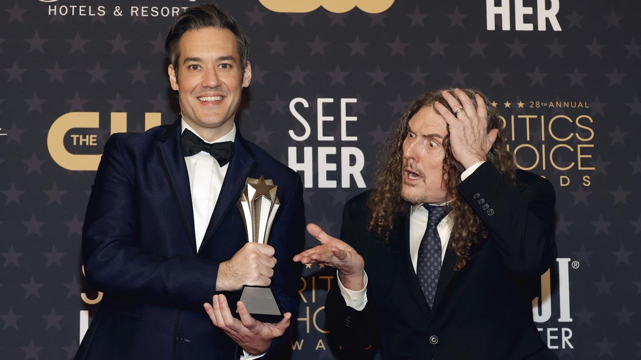 Eric Appel and ‘Weird Al Yankovic with their Critics Choice Award for Best Movie Made for Television. Picture: Getty Images for Critics Choice Association