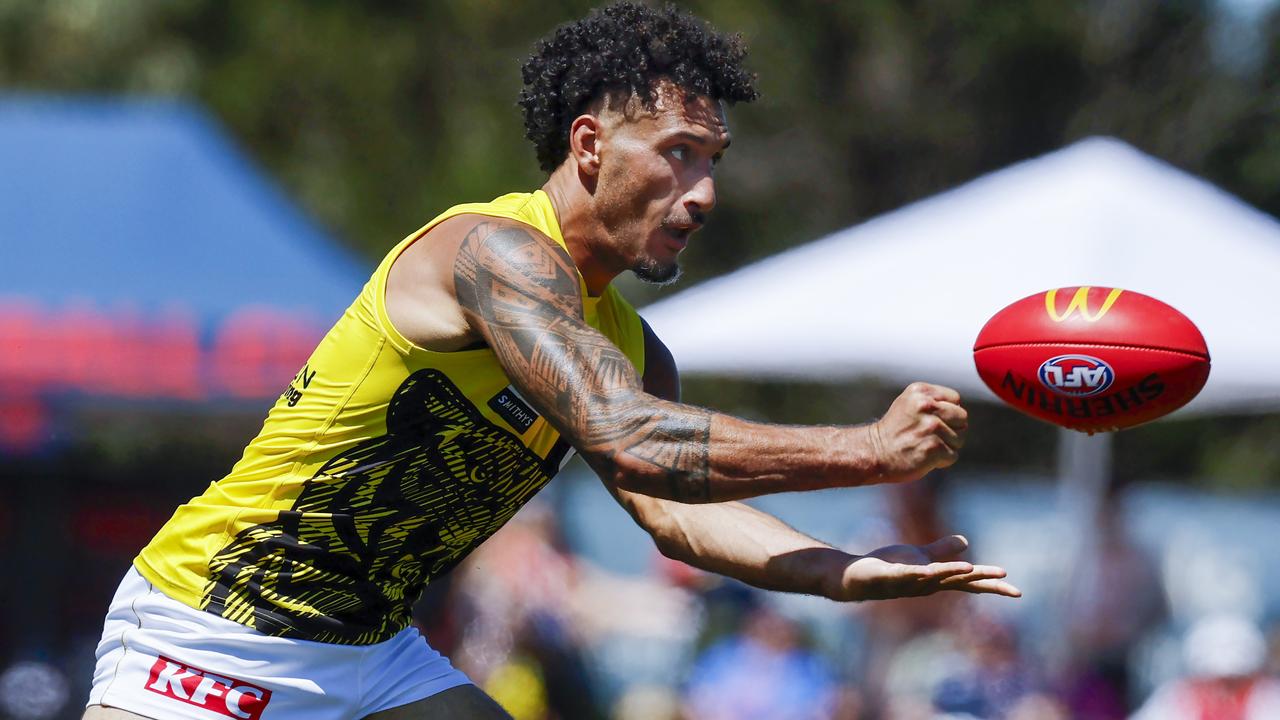 MELBOURNE , AUSTRALIA. February 18 , 2024. AFL. Melbourne vs Richmond practise match at Casey Fields. Mykelti Lefau clears by hand . Pic: Michael Klein