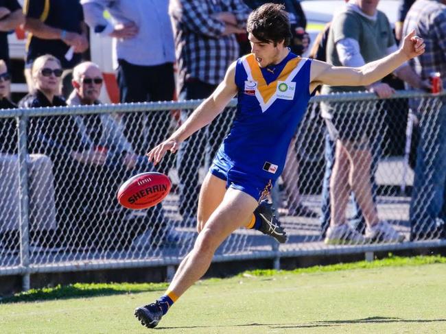 Heathmont young gun Bailey Stevens gets a kick away in the Eastern Football League (EFL). Picture: Chris Mirtschin