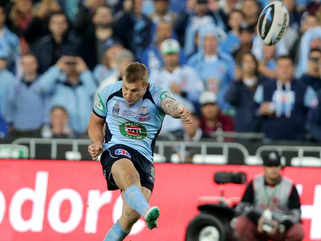 Trent Hodkinson kicks the goal to win the 2014 State of Origin series at ANZ Stadium. Picture: Gregg Porteous