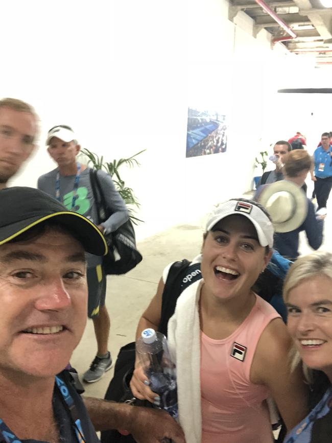 Rising Aussie tennis champion Kimberly Birrell, pictured with parents John and Ros, following her round 2 win on Wednesday