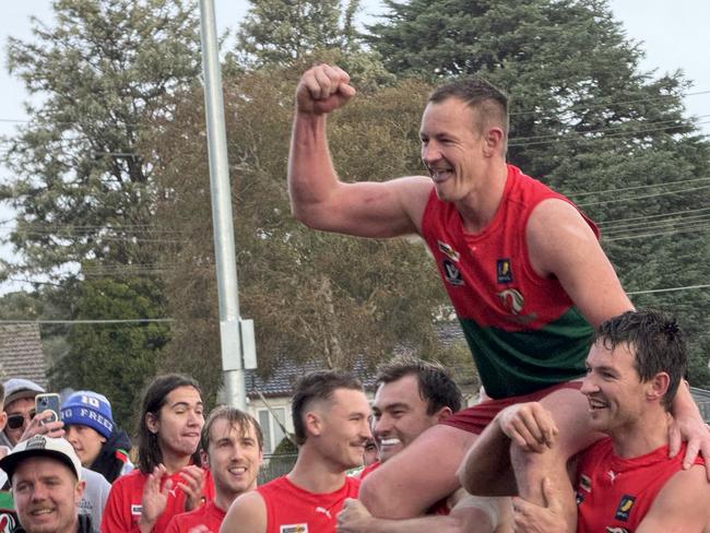 Beau Hendry is chaired off after helping Pines to victory in his 300th game.