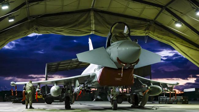 British Royal Air Force weapon technicians prepare a RAF Typhoon FRG4s aircraft prior further strikes against Houthi military targets in Yemen at RAF Akrotiri base in Cyprus. Picture: Leah Jones/Minister of Defenceo Crown Copyright via Getty Images