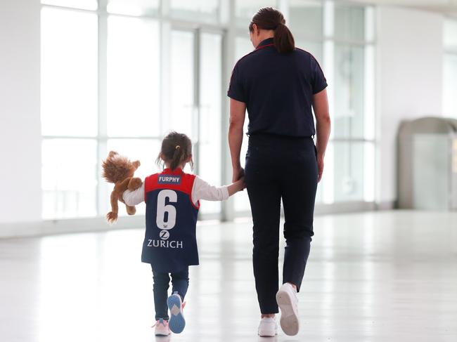 Daisy Pearce and daughter Sylvie at the Demons AFLW Press Conference announcing the retirement of Pearce. Picture: Getty Images