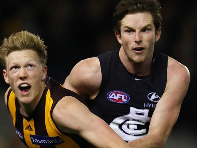 AFL Round 22. Carlton v Hawthorn at Etihad Stadium. Hawthorn's James Sicily and Carlton's Jed Lamb do battle  . Pic: Michael Klein