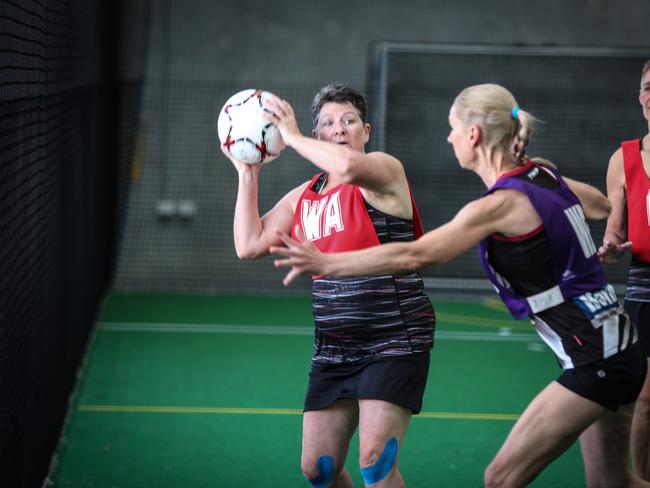 Indoor netball action on the Gold Coast. Picture: Paul Harris Photographer