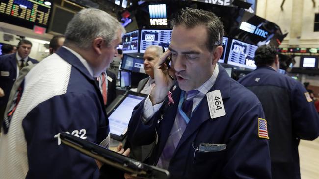 Trader Gregory Rowe works on the floor of the New York Stock Exchange, Wednesday, Nov. 25, 2015. Stocks are drifting higher in early trading as markets start to wind down ahead of the Thanksgiving holiday in the U.S. (AP Photo/Richard Drew)
