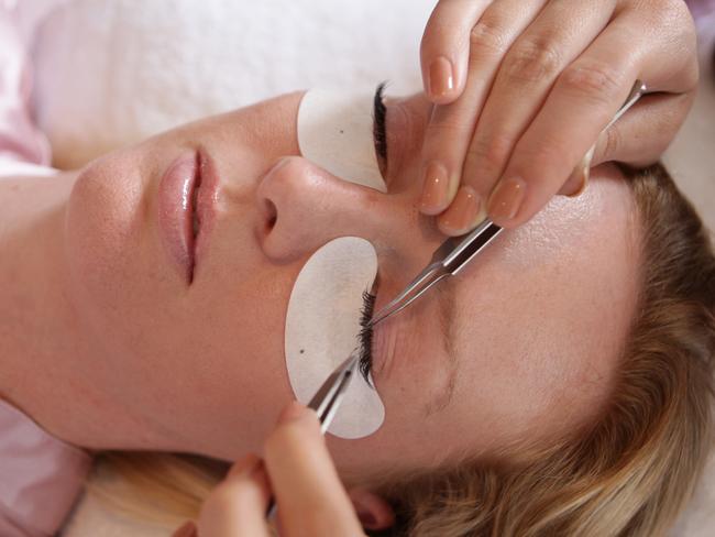 Jane Stabler gets some eye lash extensions by Charlotte Creasey. Picture: Chris Pavlich