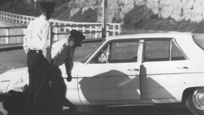 Police at the scene where Raymond Hill and Irene Rees were murdered near South Newcastle beach January 1970.