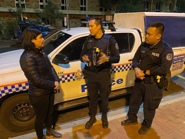 Chief Minister Natasha Fyles talking to police officers in Alice Springs.