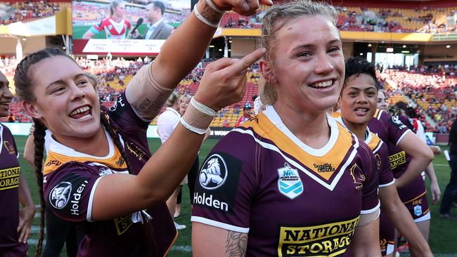 Julia Robinson of the Broncos (right) is tackled by Ruan Sims of the  Roosters during the NRL Women's Premiership match between the Sydney  Roosters and the Brisbane Broncos at Allianz Stadium in