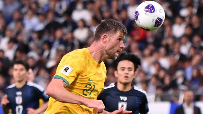 SAITAMA, JAPAN - OCTOBER 15: Cameron Burgess of Australia in action during the FIFA World Cup Asian Third Qualifier Group C match between Japan and Australia at Saitama Stadium on October 15, 2024 in Saitama, Japan.  (Photo by Kenta Harada/Getty Images)