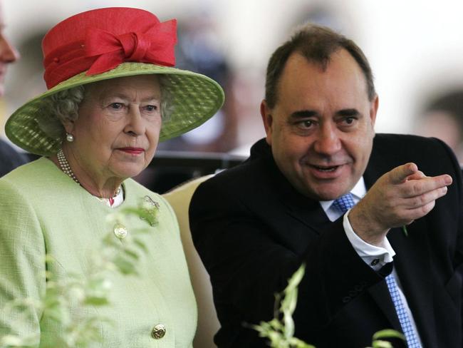 Queen Elizabeth II with Scotland's Alex Salmond as they view the riding procession during the ceremonial opening of the Scottish Parliament. Picture: AP