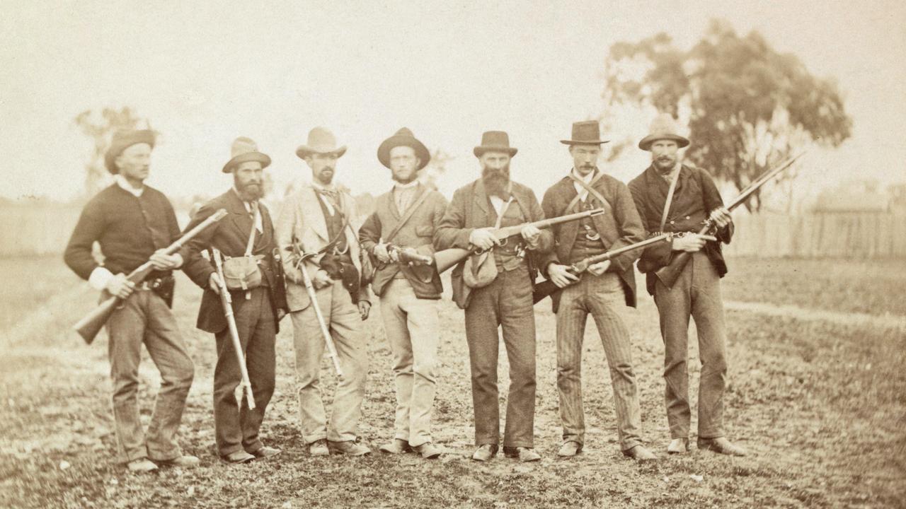 Long hunt ... lawmen like the four ambushed at Stringybark spent years on Kelly’s trail. Some of them pose here after bringing down and capturing the killer in his last shootout at Glenrowan in 1880. State Library of Victoria