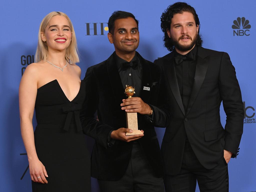 Emilia Clarke and Kit Harington pose with Aziz Ansari and his award for Best Performance by an Actor in a Television Series Musical or Comedy for ‘Master of None’ in the press room during The 75th Annual Golden Globe Awards at The Beverly Hilton Hotel on January 7, 2018 in Beverly Hills, California. Picture: Getty