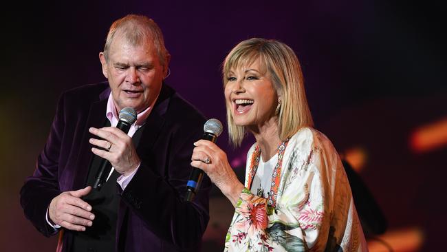 John Farnham (left) and Olivia Newton-John perform during the Fire Fight Australia bushfire relief concert. Picture: AAP