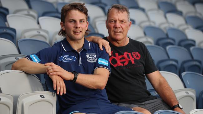 Geelong forward Tom Atkins with his father Mick. Picture: Alex Coppel