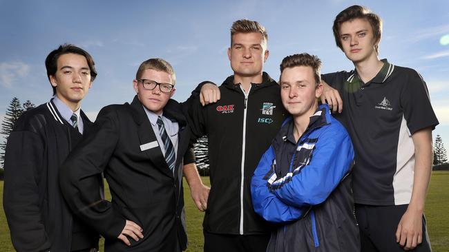 Port Adelaide Vice Captain Ollie Wines with schoolboys from Ocean View College Joshua Kilburn, 17, Sanders Crawford, 16, Jared Stevens, 18 and Harry Donnelly, 18. Picture: Sarah Reed