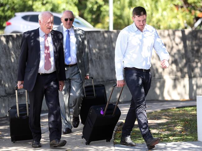 Horse Trainer Ben Currie (right) arrives at the Queensland Racing Integrity Commission alongside QC Jim Murdoch.