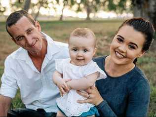 Louis Moore and Courtney Leverington with their daughter Ayla. Picture: Contributed