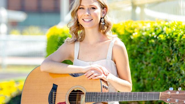 HOLD SATURDAY COURIER MAIL 7TH SEP  Caitlyn Shadbolt poses for a photograph at Doomben Racecourse to promote Country Music Raceday, Monday, September 2, 2019 (AAP Image/Richard Walker)