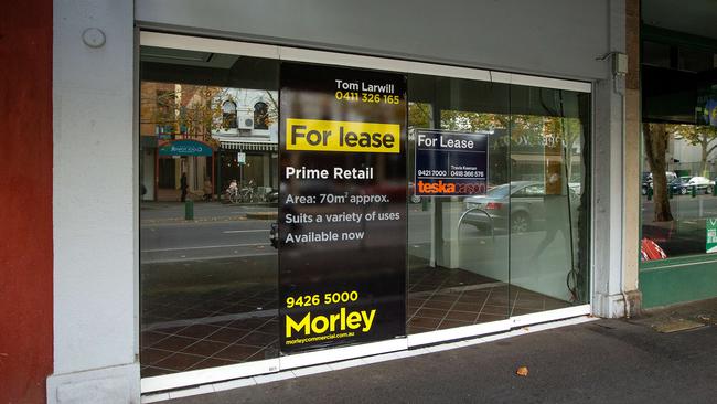 Empty shop fronts are common along Lygon St. Picture: Mark Stewart