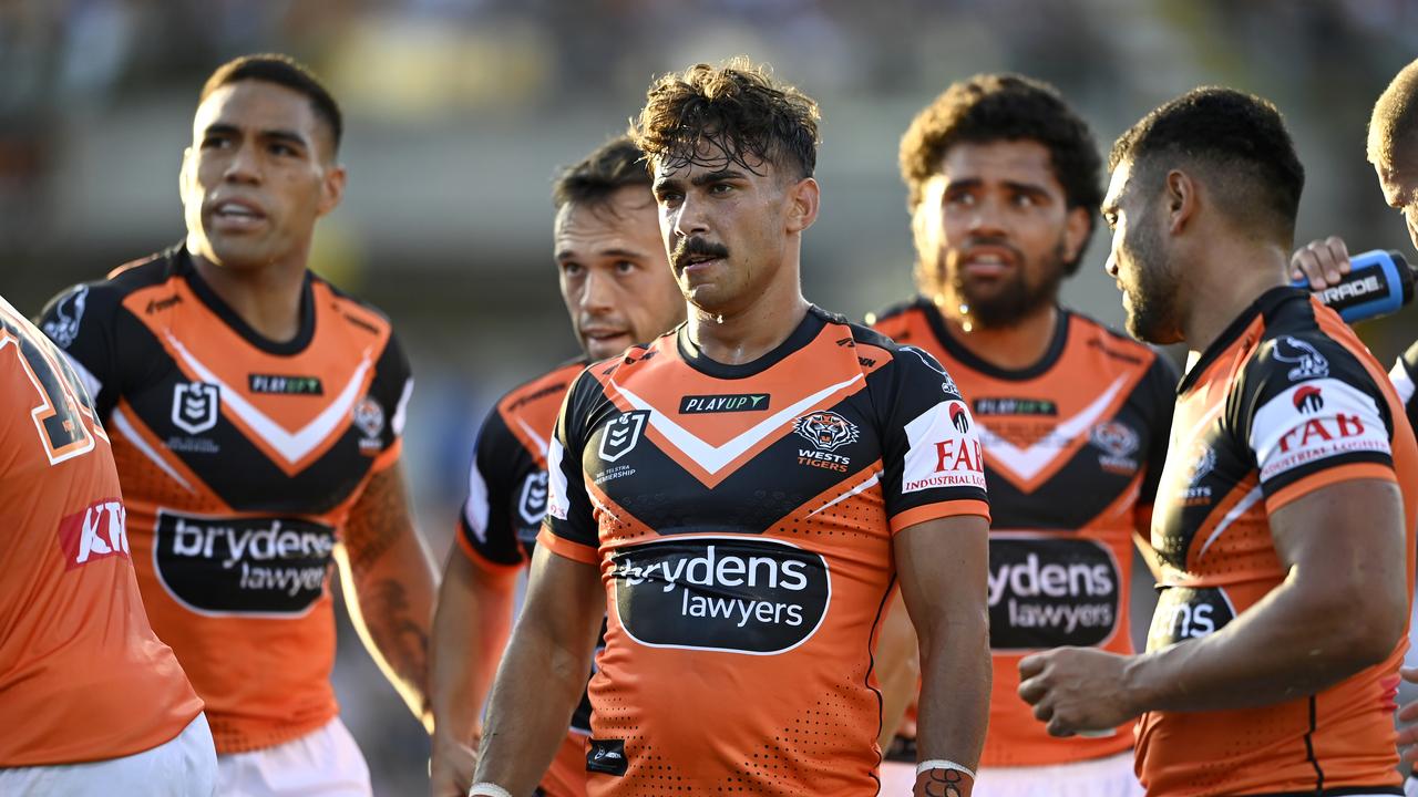 The Wests Tigers fans celebrate after victory in the NRL Grand