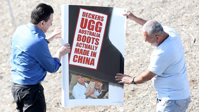 Australian Ugg boot maker Eddie Oygur and Nick Xenophon launch a demonstration outside the Decker Outdoor Corporation at their headquarters in Goleta, California. Picture: Coleman-Rayner