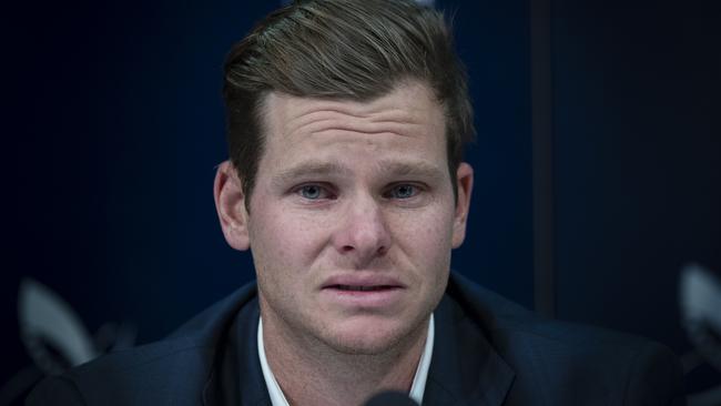 Steve Smith fronts the media at Sydney International Airport.