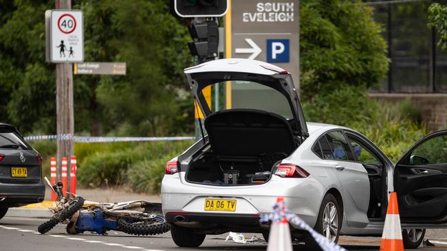 The aftermath of the crash, the bike Jai was riding lies on the floor, the parking sign behind is the location of the memorial. Picture: Julian Andrews