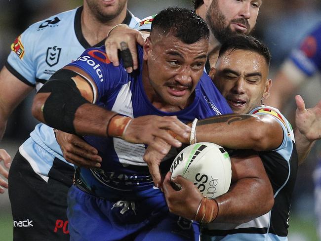 SYDNEY, AUSTRALIA - APRIL 24: Ava Seumanufagai of the Bulldogs is tackled during the round seven NRL match between the Cronulla Sharks and the Canterbury Bulldogs at Netstrata Jubilee Stadium, on April 24, 2021 in Sydney, Australia. (Photo by Jason McCawley/Getty Images)