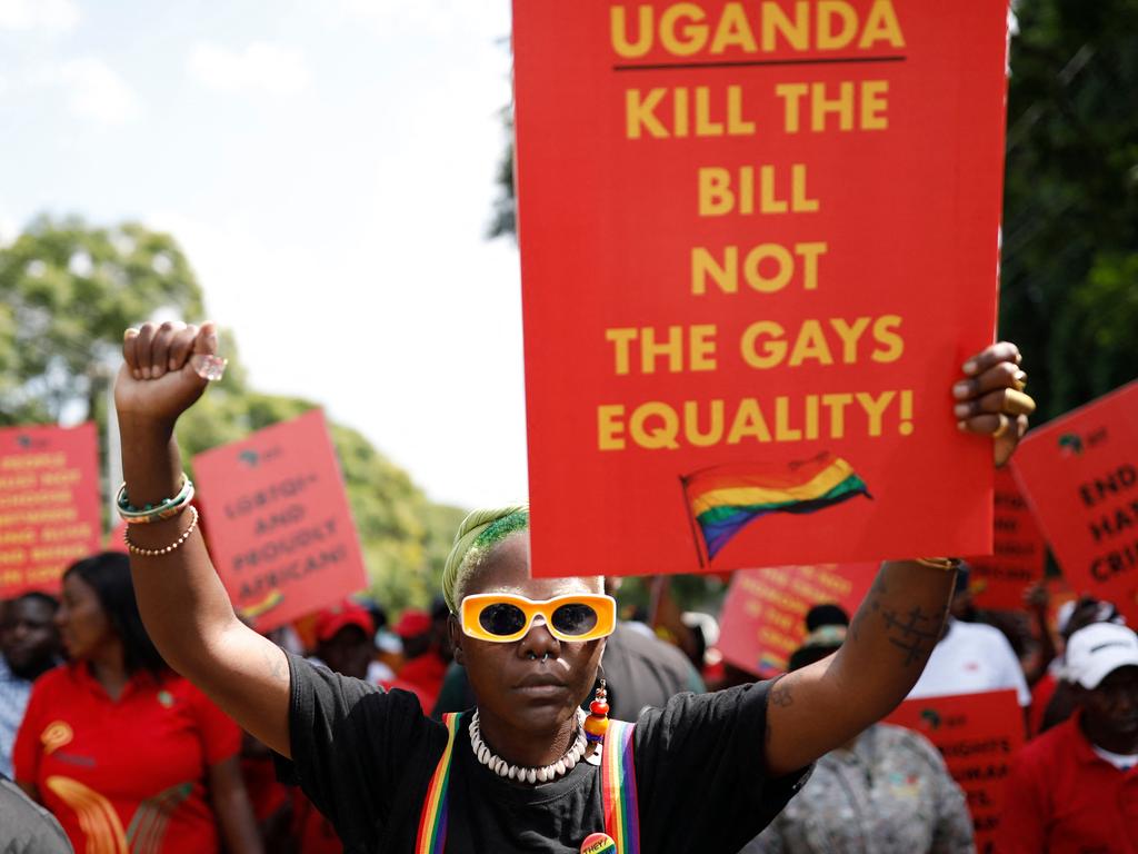 Ugandan queer activist Papa De raises her fist outside the Uganda High Commission in Pretoria, South Africa amid Uganda draconian anti-gay legislation. Picture: Phill Magakoe / AFP