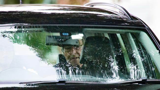 Cardinal George Pell peers through the front window of the car that took him from Barwon prison on Tuesday after his convictions were quashed. Picture: Mark Stewart