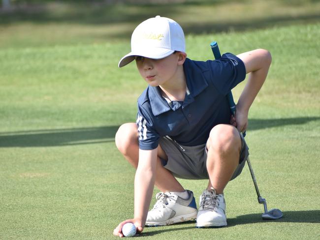 The Gold Coast's George Whyte lines up a putt at the US Kids Golf Foundation Australian Open at the Rockhampton Golf Club on September 27.