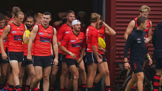 Conor McKenna and James Stewart (right) look on during an Essendon Bombers AFL training session at The Hangar in Melbourne on March 5.